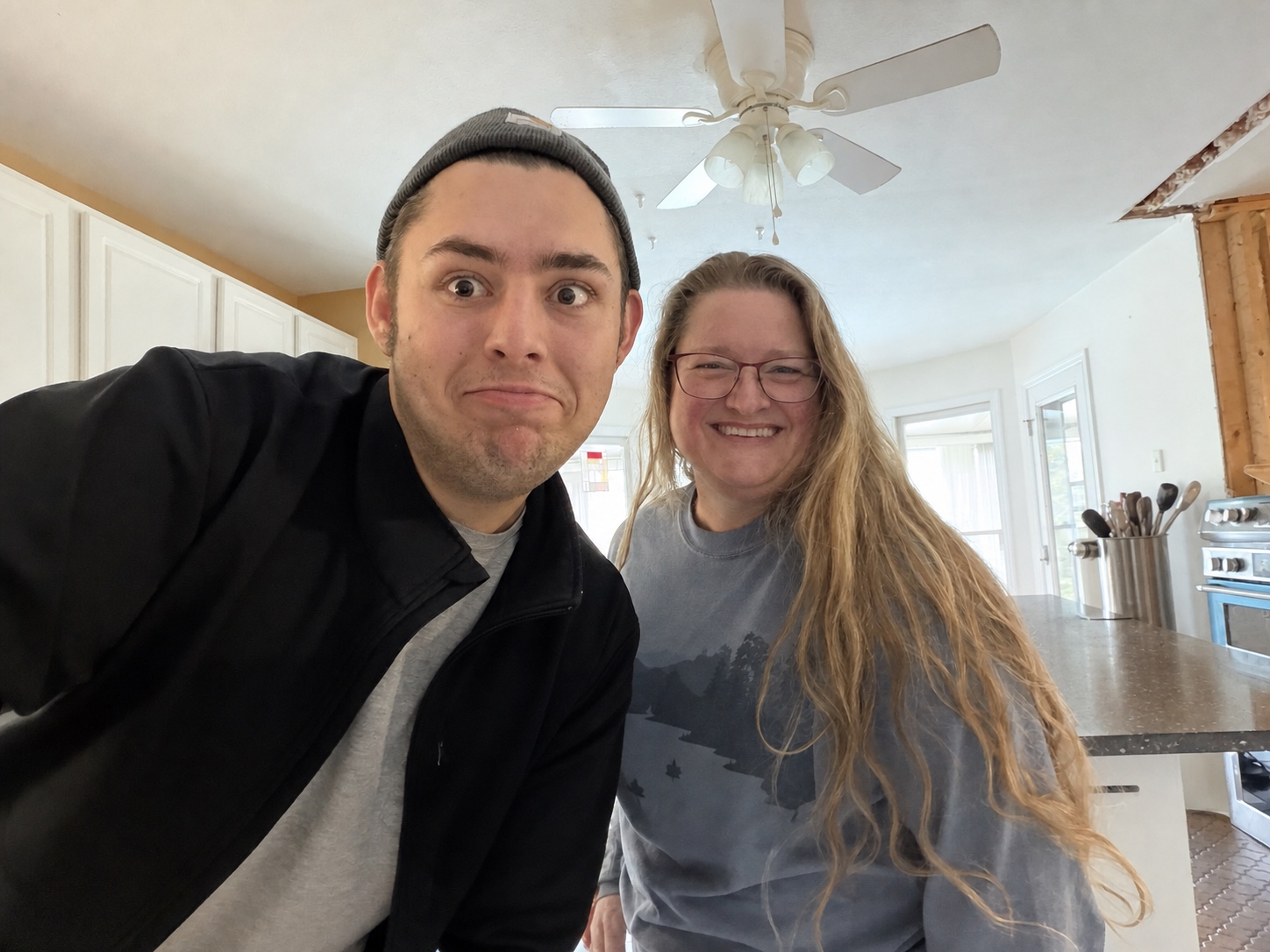 Adam and Carly Leveille together during a home workday.