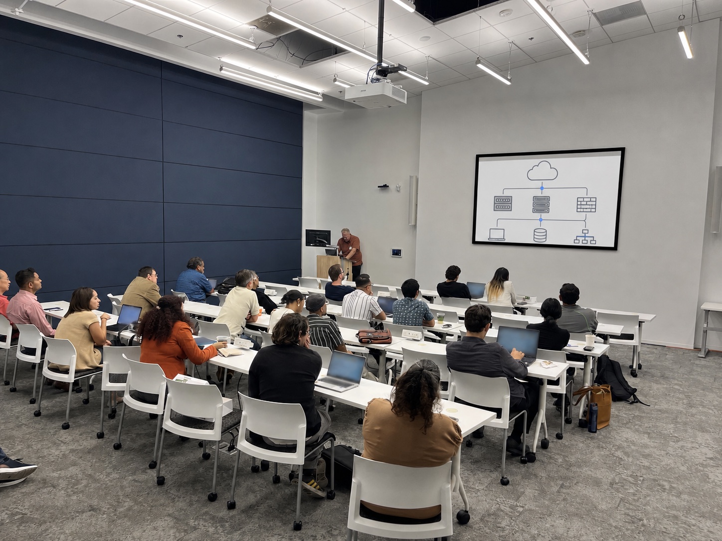 Technology professionals attending a cloud and infrastructure learning session.