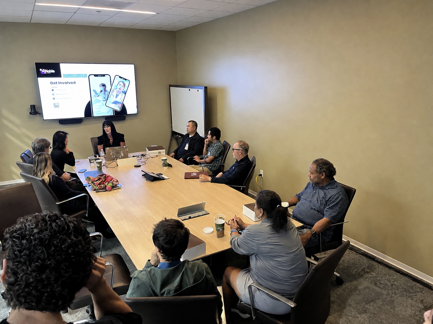 Community and nonprofit leaders in a roundtable discussion.