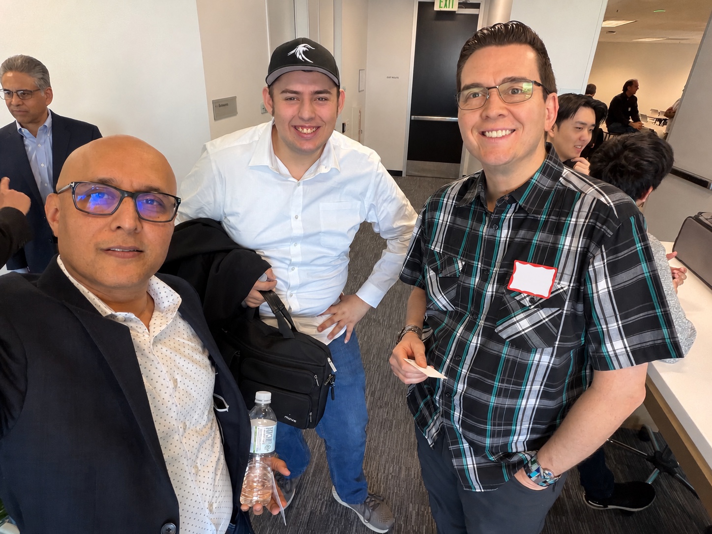 Adam Leveille with technology professionals at an industry event.