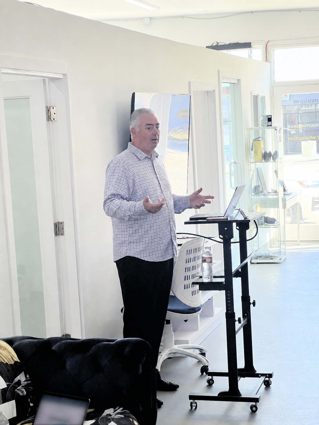 David Leveille presenting practical business guidance at a community event.