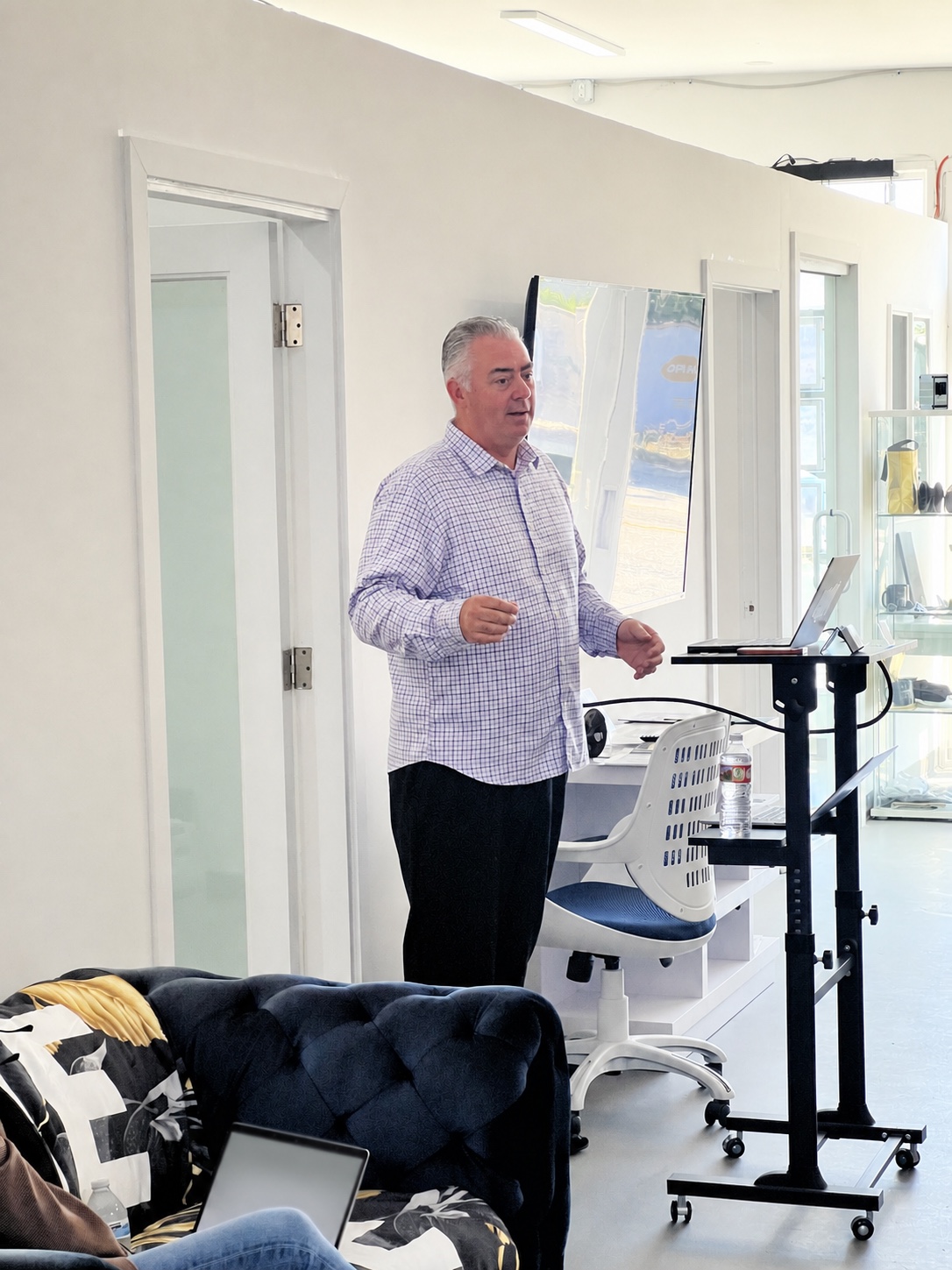 David Leveille presenting at a community business event.